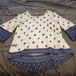 White blouse with Aztec patterns